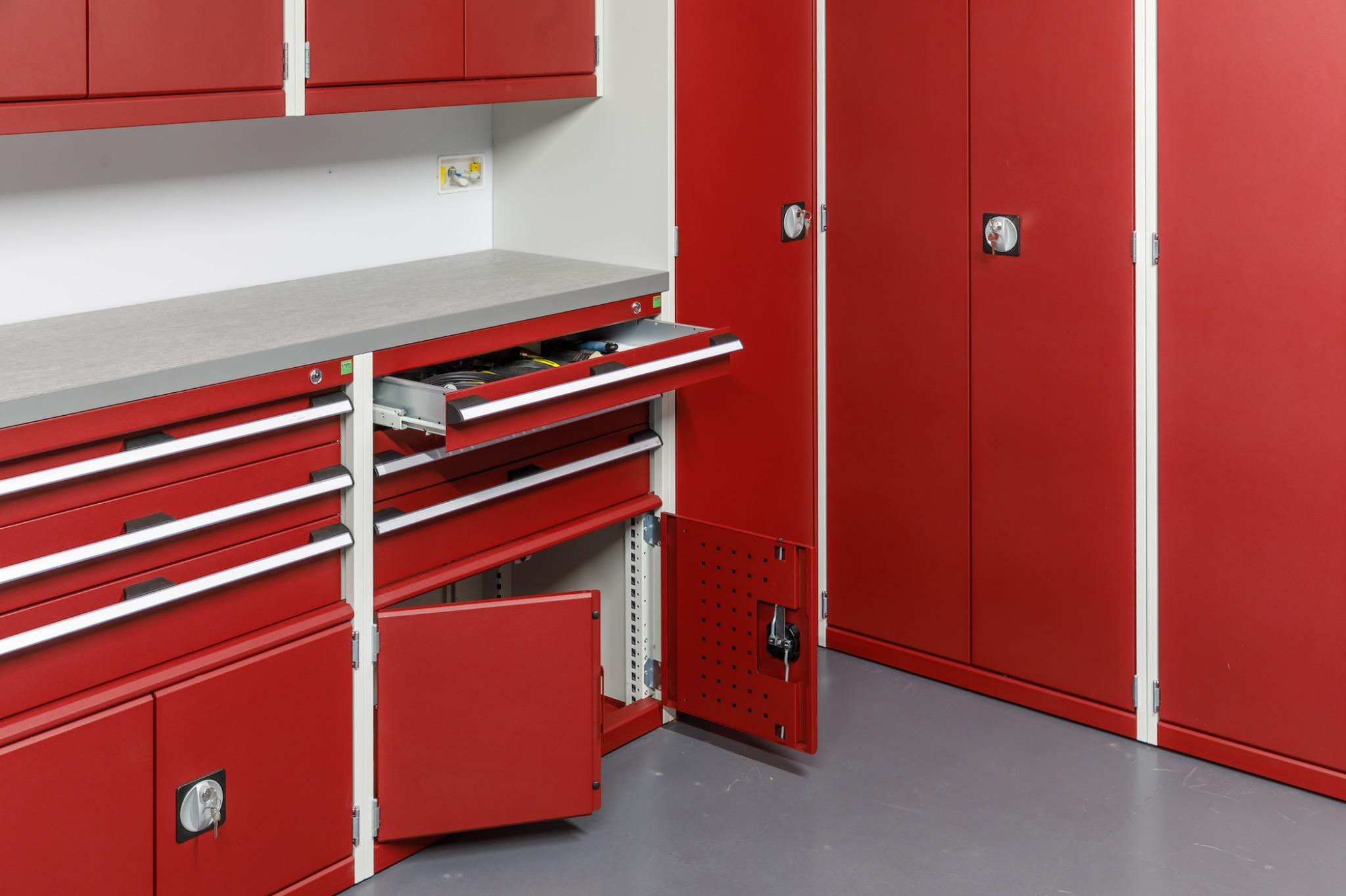 GaragePride garage with heavy-duty shelving and red cabinets