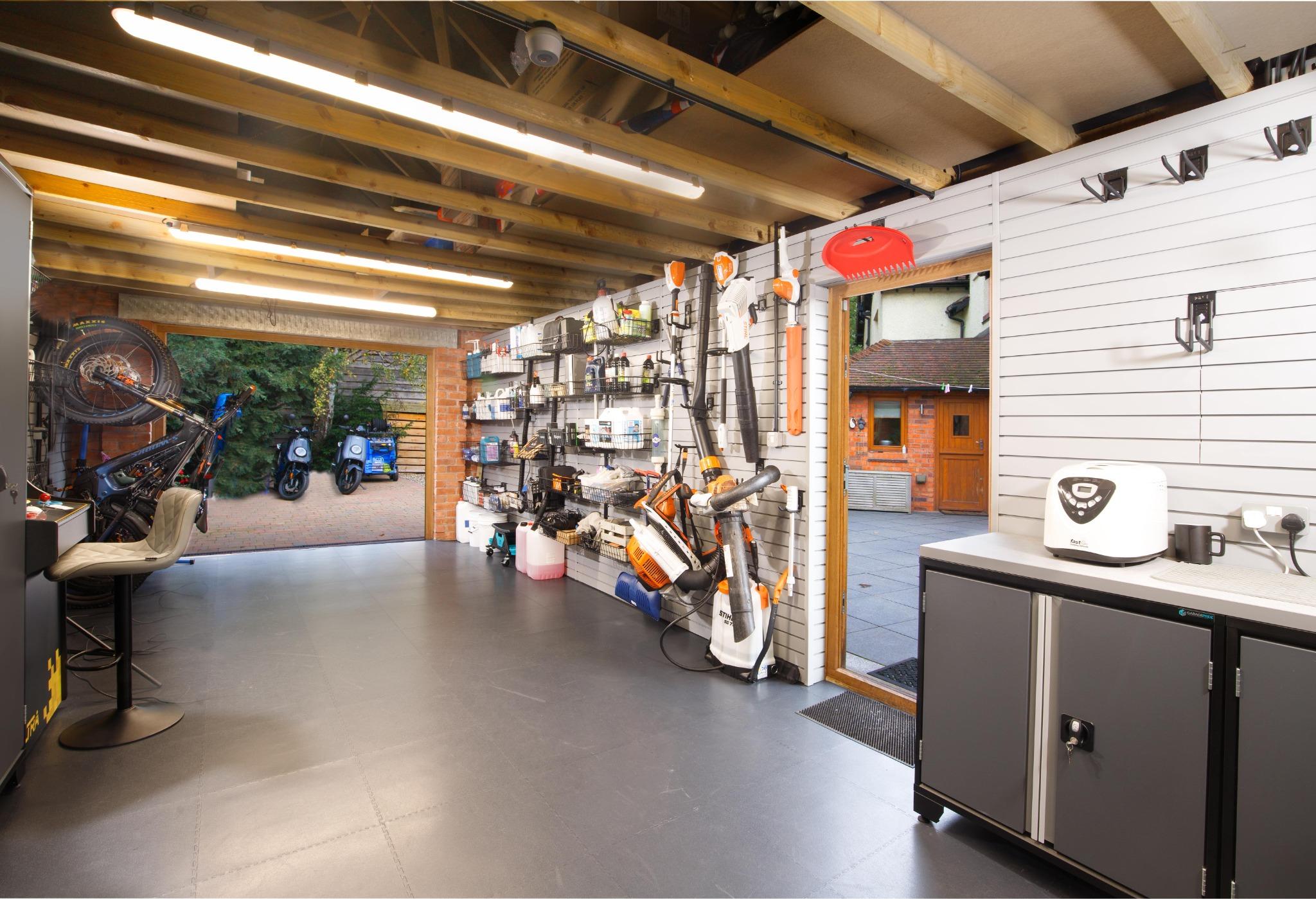 Bright LED lighting over a GaragePride garage workbench
